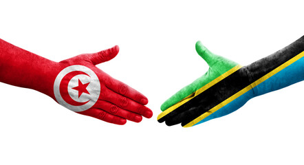 Handshake between Tanzania and Tunisia flags painted on hands, isolated transparent image.