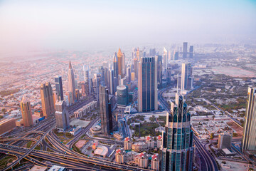 Obraz na płótnie Canvas Dubai city view at sunset, Sheik Zayed Road. UAE, 2022