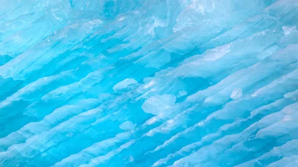 Fototapete Gletscher A close-up of the layered surface of a blue glacier - Knud Rasmussen Glacier near Kulusuk - Greenland, East Greenland  © muratart