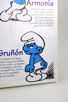 Grouchy Smurf. Schtroumpf Grognon. Muffi Schlumpf, Griesgramschlumpf. The Smurfs storybook.   Characters created by Peyo. TV series. Book for children.