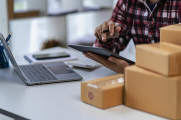 SME Business Entrepreneur Working From Home With Parcel Boxes And Laptop Taking Orders And Shipping Online Grocery Business Ideas