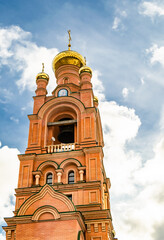 Fototapeta na wymiar Christian church cross in high steeple tower for prayer