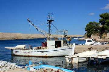 Fototapeta premium Fishing Boat in the Harbor of Miškovići, Pag Island, Croatia 