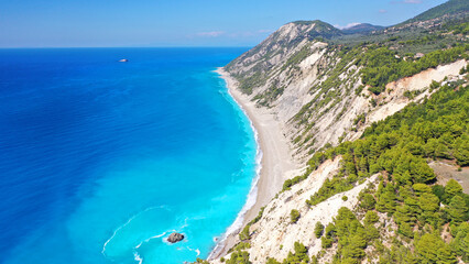 Aerial drone photo of famous paradise beach of Egremni white steep rocky hills overlooking deep turquoise Ionian sea, Lefkada island