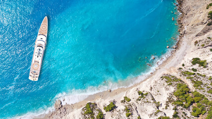 Aerial drone photo of famous paradise beach of Egremni white steep rocky hills overlooking deep turquoise Ionian sea, Lefkada island