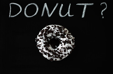 donut on a black background and the inscription donut?