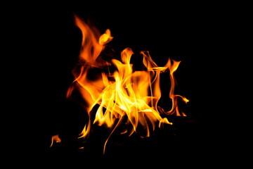 Fire flame texture. Burning material backdrop. Burn effect pattern. Blaze and torch wallpaper. Heat and haze backdrop.