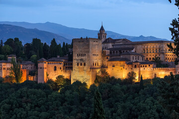 Night view of Alhambra de Granada. It is one of the best-preserved palaces of the historic Islamic world, in addition to containing notable examples of Spanish Renaissance architecture.