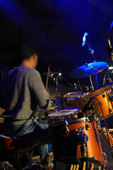 Fototapeta na wymiar músico tocando la batería en un concierto 4M0A5516-as22