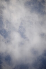 white cirrus clouds against the blue sky, white clouds against the blue sky before the rain in Ukraine