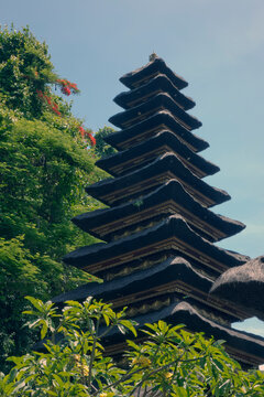 Traditional Padoga Against Forest and Blue Sky, Bali, Indonesia