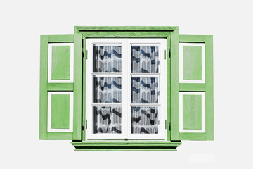 Wooden window village cottage house. Architecture texture. Green paint open window shutters. Object isolated on white window. Empty copy space rustic window frame background.