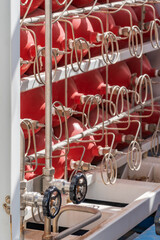 Metal bottles joined by tubes used for the transport of hydrogen, H2, according to ADR regulations.