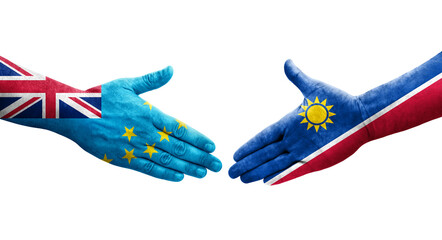 Handshake between Tuvalu and Namibia flags painted on hands, isolated transparent image.