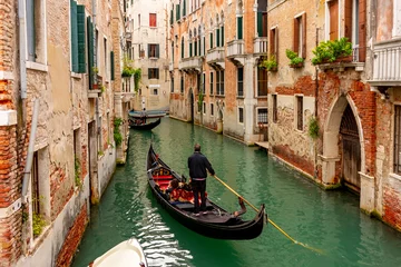 Acrylic prints Gondolas Gondolas on Venice canals, Italy