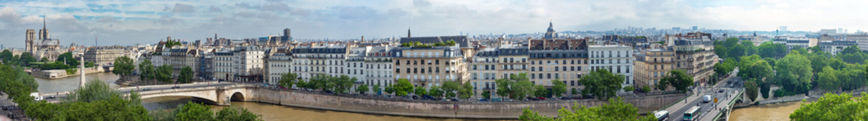 Fototapeta na wymiar Panoramic view of Notre Dame de Paris Cathedral, River Seine, Tournelle Bridge