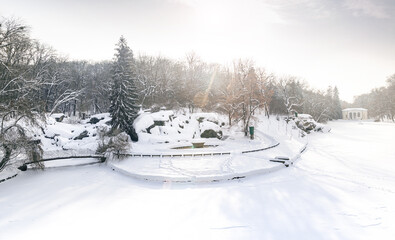 Beautiful winter view of the pond Ionian sea, Flora Pavilion and Assembly square in the park Sofiyivka, Uman, Ukraine