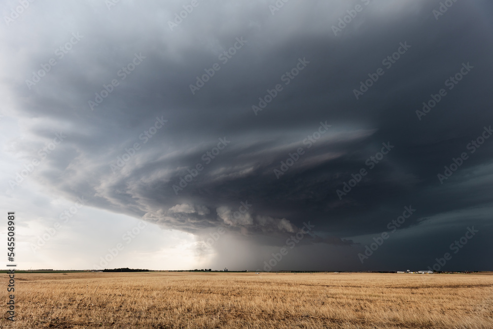 Canvas Prints storm clouds from a supercell thunderstorm over a field in kansas