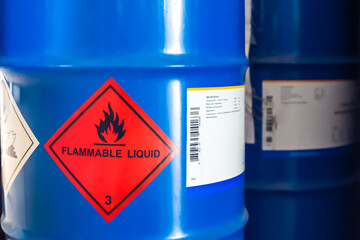Label of flammable liquid, hazardous chemical warning symbol on the chemical barrel show caution for use, dimethylbutane, methanol, ethanol, butanol. Industrial use and scientific research. - obrazy, fototapety, plakaty