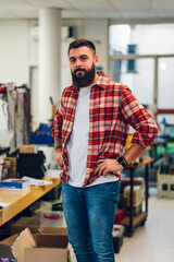 Portrait of an electronics engineer working in a workshop