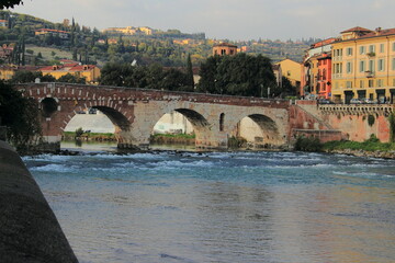 Walking with a camera in the old city of Verona © emmanuelebaldassarre