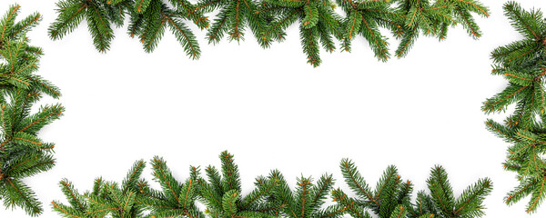 Merry Christmas frame made of green fir branches on white background. Happy New Year and Xmas, top...
