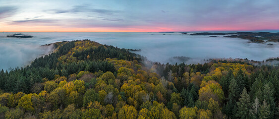 Panoramic view on the Odenwald near Lampenhain and Fog over the Rhine Valley in Germany.