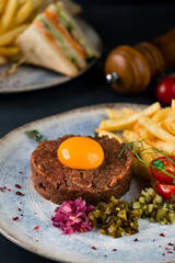 Steak tartare appetizer classic. Grade a Kobe beef mixed with eggs, red onions and capers