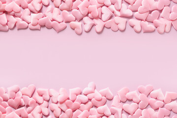 Pink romantic hearts on pink background. Valentine's day greeting card as banner. Love concept. Copy space.