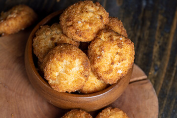 Delicious cookies with coconut on the table