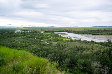 Fototapeta na wymiar Green Oldman River Valley landscape