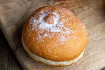 sweet donuts with milk cream filling inside