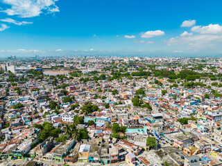 Fototapeta na wymiar Aerial panoramic cityscape of Santo Domingo, Dominican Republic. Latin American city by the sea