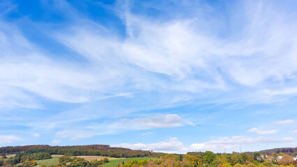 Blue sky and white clouds. Freshness of the new day. Bright blue background. Relaxing feeling like...