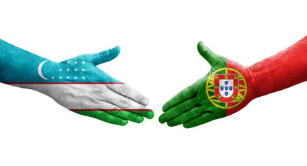 Handshake between Uzbekistan and Portugal flags painted on hands, isolated transparent image.