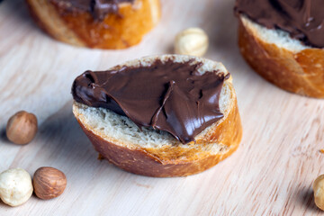 chocolate butter spread on a baguette, close up