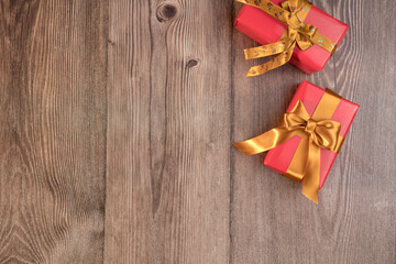 Two gift boxes on wooden table