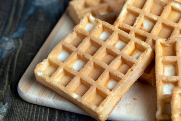 square sweet soft waffles on the table