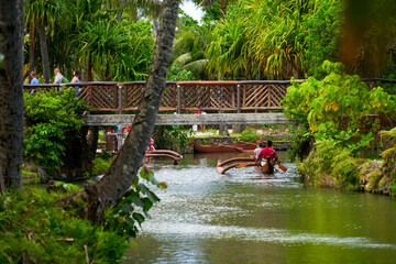 Laie, Hawaii - February 21, 2022 : Outrigger canoe river tour at the Polynesian Cultural Center on...