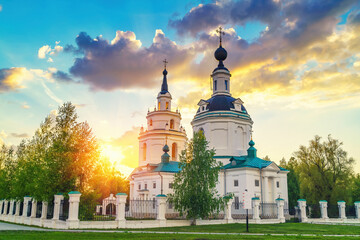 Fototapeta na wymiar Clouds over Russian orthodox church at sunset. Russia