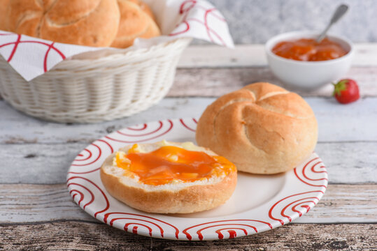 Traditional homemade bread rolls with apricot spread