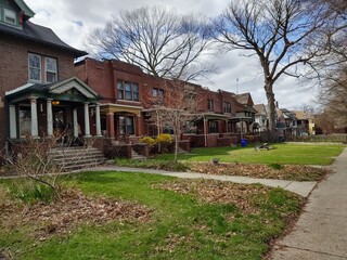 an urban block with variety of housing units and gracious front lawns