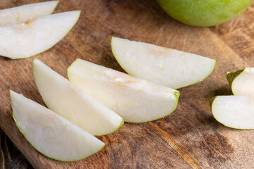 Sliced ripe green pear, close up