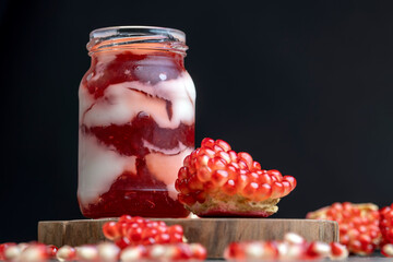 Fresh delicious milk yogurt with pomegranate flavor