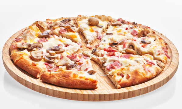  Wooden plate of carbonara slices pizza over white isolated background