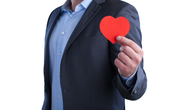 businessman with a red heart paper in suit isolated on white background