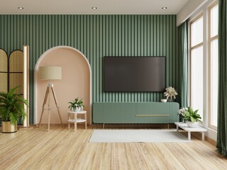 Living room with tv on cabinet in dark green color wall,Japandi style.