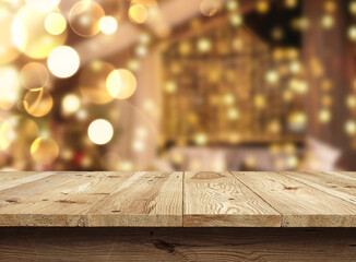 Wooden table with Christmas or new year background