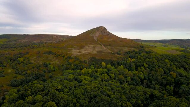 Aerial view of Roseberry Topping a distinctive hill in North Yorkshire, England. It is situated near Great Ayton and Newton under Roseberry, UK