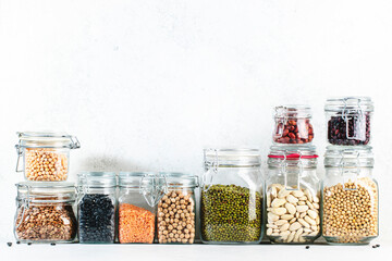 Legumes and beans. Dried, raw and fresh. Lentils, chickpeas, mung beans, soybeans, edamame, peas in...
